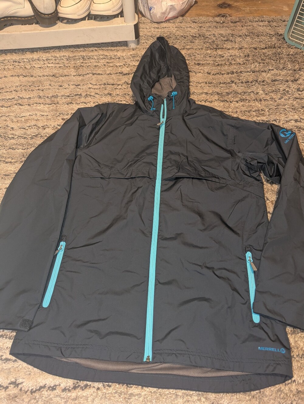 Merrell  Raincoat with Teal Accents